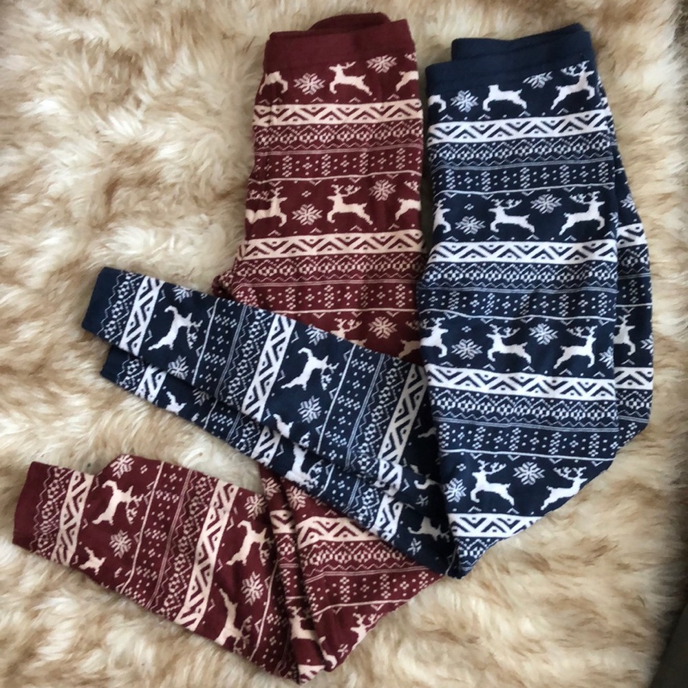TWO pairs of reversible reindeer leggings